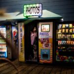 Photo Of Woman Standing Inside Photo Booth